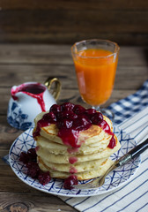 Delicious pancakes with cherry jam