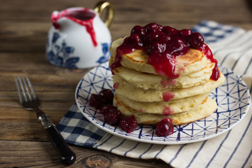 Delicious pancakes with cherry jam