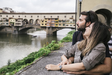 Fototapeta premium Young couple in love visiting the city of Florence in Italy