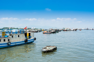 Fototapeta na wymiar Fishing boats parking at Yangjiang Harbor of China