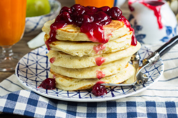 Delicious pancakes with cherry jam