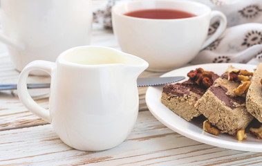 Marble sesame halva with cocoa and cup of tea