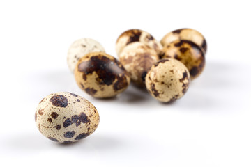 Quail eggs on white