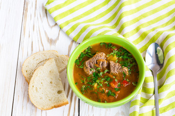 Caucasian lamb or beef Shurpa soup with vegetables