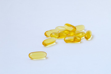 Fish oil, omega 3 and vitamin D capsules.