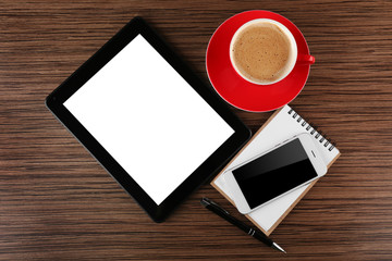 Top view of office desk with coffee and accessories