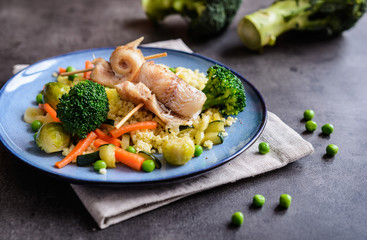 Roasted cod rolls with millet and steamed vegetable