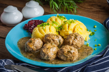 Meatballs with potatoes in dill sauce.