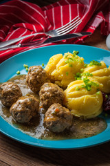 Meatballs with potatoes in dill sauce.