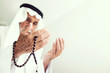 elderly muslim arabic man praying