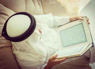 Senior man reading book