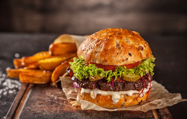 Home made hamburger with lettuce and cheese - obrazy, fototapety, plakaty