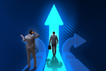 Fototapeta premium Businessman in difficult choice concept