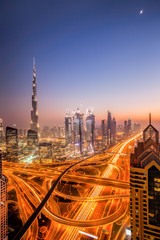 Naklejka premium Dubai city at night, view from skyscraper in United Arab Emirates