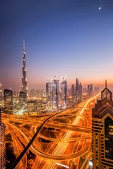 Photo sur Plexiglas moyen-Orient Dubai city at night, view from skyscraper in United Arab Emirates