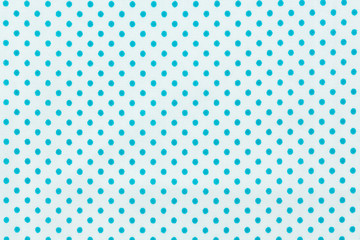 Polka dots in white and blue pattern fabric.