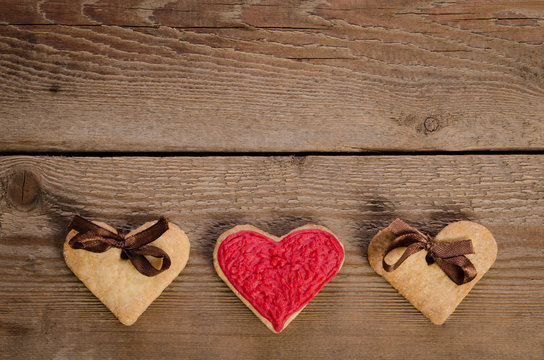  cookies-hearts  on  wooden table