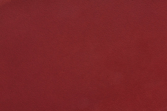 Red leather texture close up.