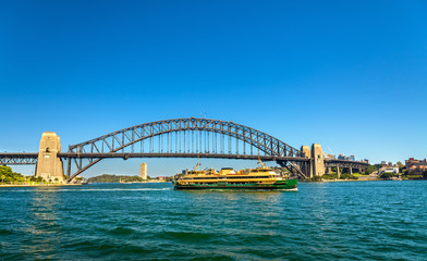 City ferry under the Sydney Harbour Bridge - Australia