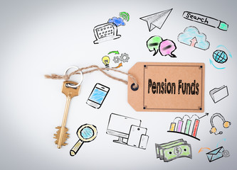 Pension Funds Concept. Key and a note on a white background. 