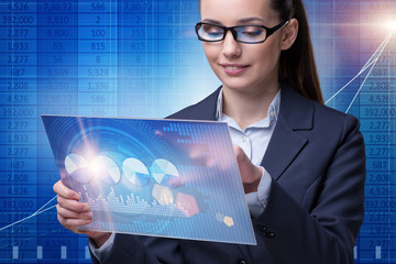 Businesswoman in stock exchange trading concept