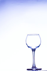 Wine is poured from a bottle into a glass
