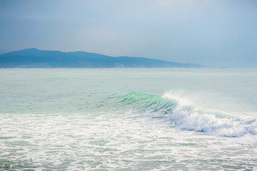 Naklejka na ściany i meble Turquoise wave in ocean.