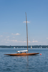 Beautiful classic sailing yacht moored on a lake on a summer day