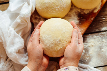 Making of pierogi with potato Vareniki. Russian food . Rustic