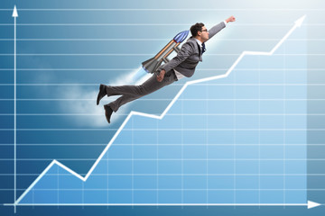 Businessman flying with rocket in funny business concept