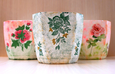 Beautiful decorative flowerpot handmade with decoupage style 