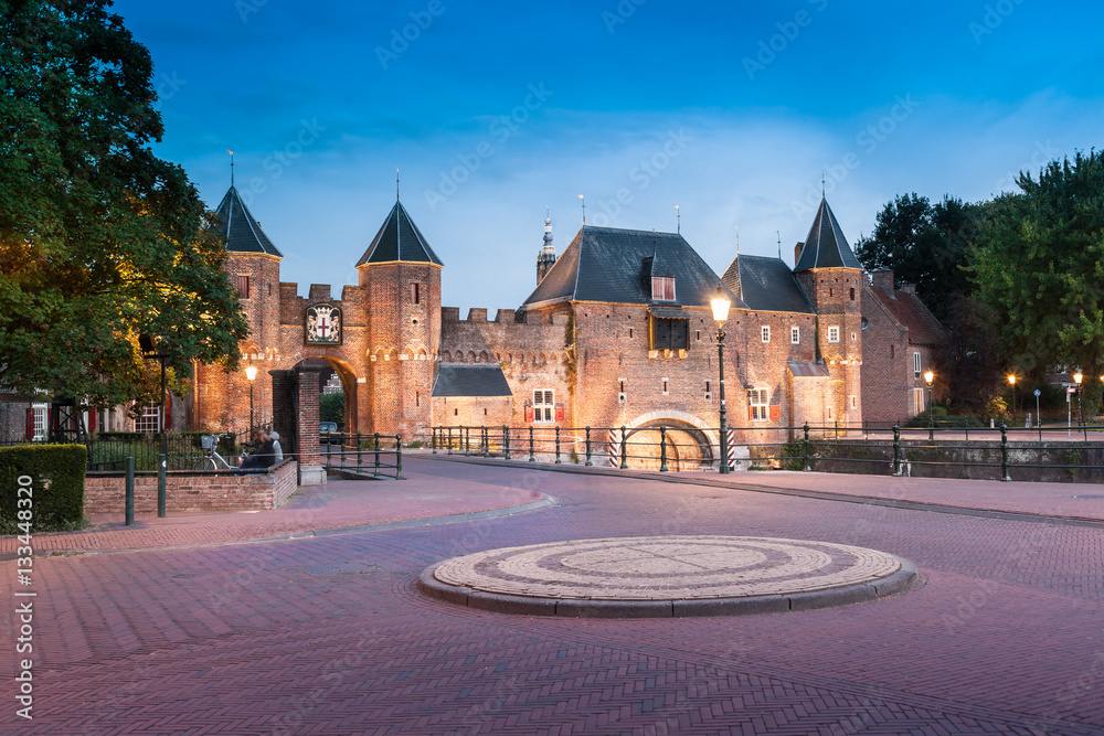 Wall mural Koppelpoort on evening