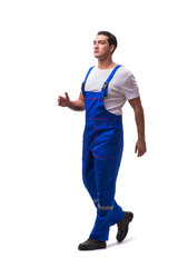 Handsome repairman wearing blue coveralls on white