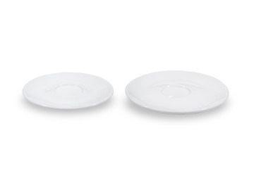 Two flat white saucers side by side smaller and bigger on white background from side