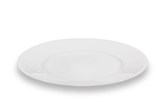 Flat white shallow porcelain plate with wide shoulders on white background from side