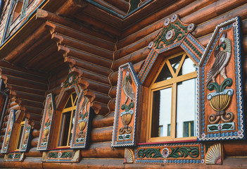 Fototapeta na wymiar Wooden house ornament in the old style