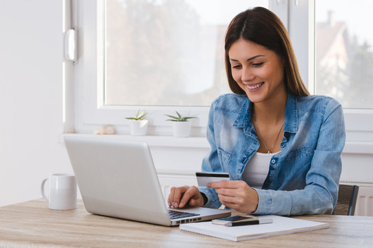 Girl Paying With Credit Card Online