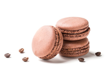 Closeup of macaroons flavored coffee on a white background