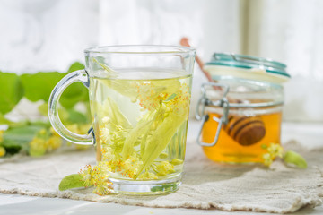 Healthy linden tea with honey in spring day