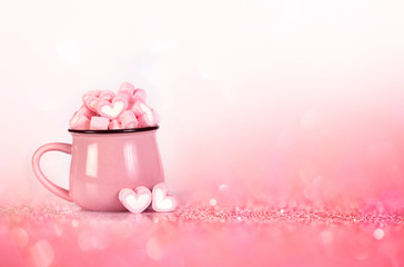 marshmallow heart shape on pink background with love concept