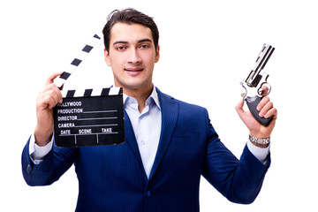 Fototapeta na wymiar Handsome man with movie clapper isolated on white