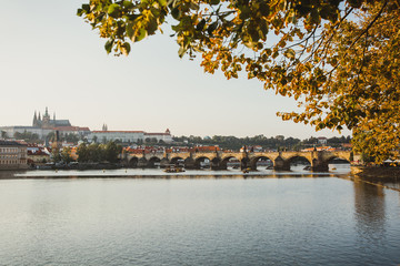 Prague panorama with historic Charles Bridge and Vltava river in Czech Republic.