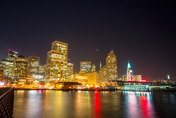 Fototapeta na wymiar Night view of San Francisco. Cityscape from Pier 14. Night sky.
