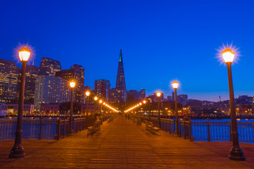 San Francisco cityscape at night from Pier 7.  Night sky and city lights.