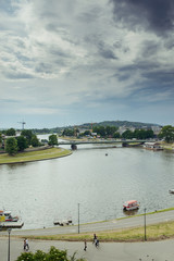 Fototapeta premium Scenic summer panorama of the city river in Cracow, Poland
