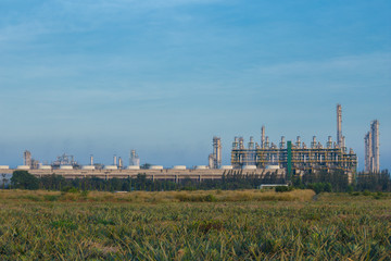 Fototapeta na wymiar Oil refinery industrial plant with sky