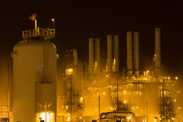 Oil refinery industrial plant at night