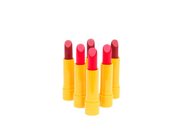 set of lipsticks red color on white background