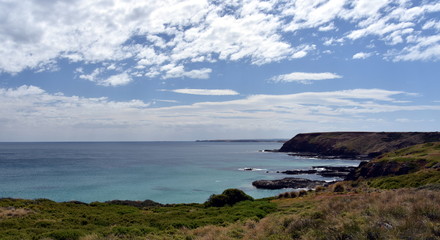 Phillip Island Nature Park - green hills and rugged coastline Victoria Australia. Rocky coastline of the Nobbies in Philip Island Australia.