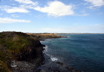 Phillip Island Nature Park - green hills and rugged coastline Victoria Australia. Rocky coastline...